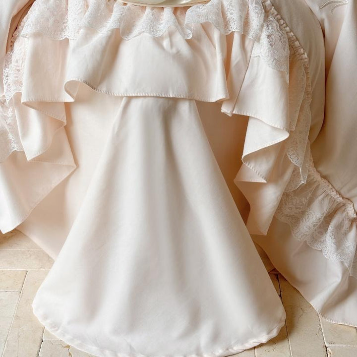 Romantic cotton bedding set with ruffles and delicate floral embroidery