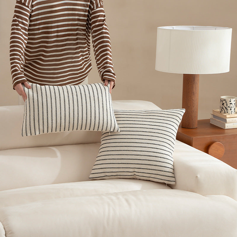 Square striped decorative pillow made of woven cotton blend with fine texture