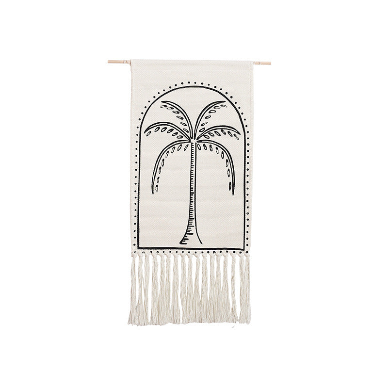 Woven wall hanging with hand-drawn mushroom motif and long cotton fringes Stornfield