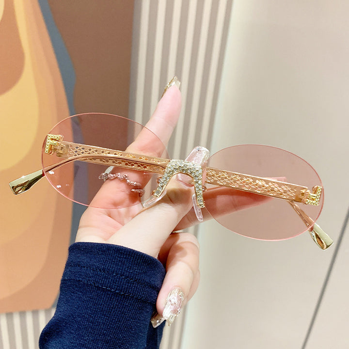Women's sunglasses with glittering frame and oval lenses Stornfield