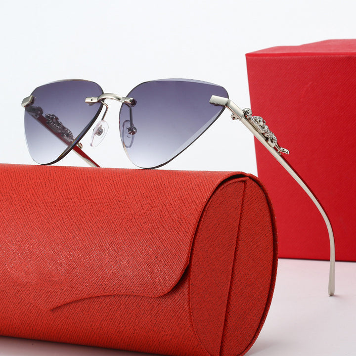 Women's Designer Sunglasses with Creative, Triangular Frame and Elegant Gold Accents Stornfield