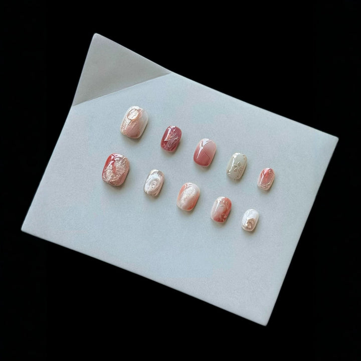 Artistic Press-On Nail Set with Marble and Metallic Accents
