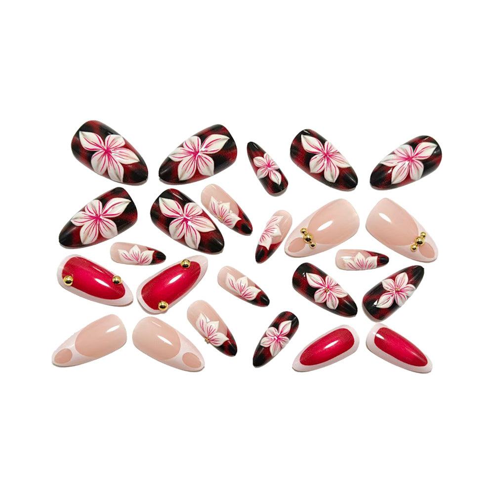 Artificial nails with floral 3D designs and elegant accents Stornfield