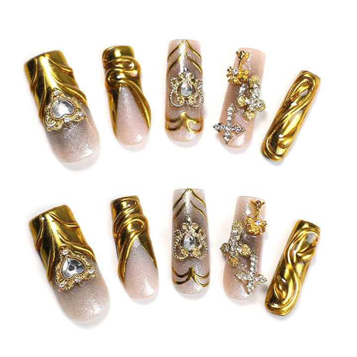 Artificial nail set with luxurious gold embellishments Stornfield