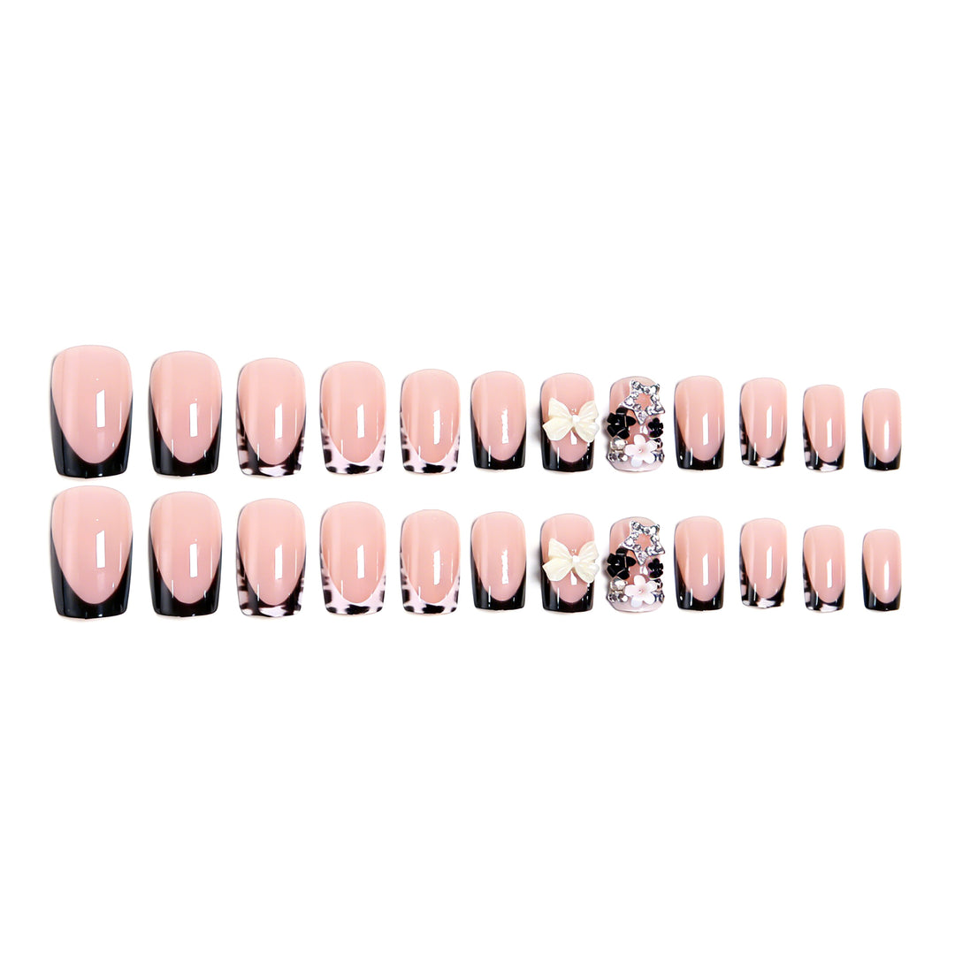 Elegant artificial nails with detailed embellishments Stornfield