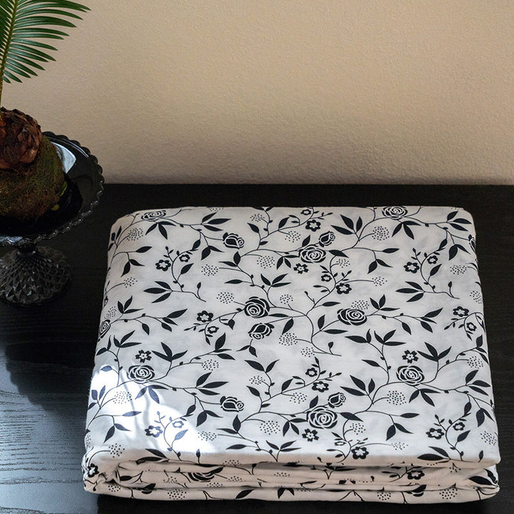 Organic Cotton Muslin Swaddle Blanket with Playful Cartoon Print