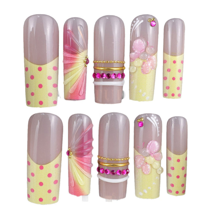 Artificial nail set with romantic flowers and playful accents Stornfield