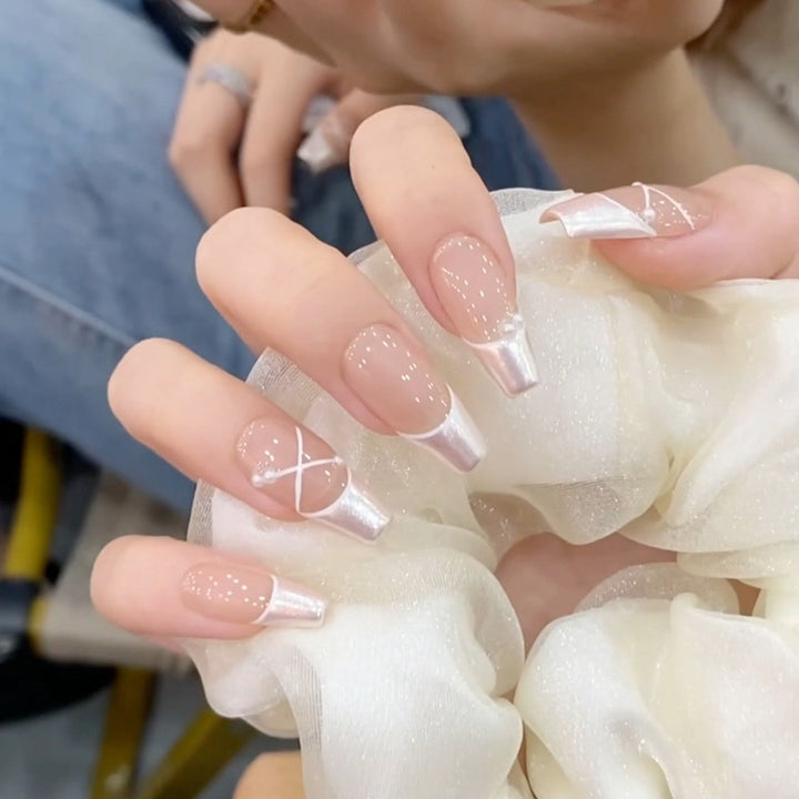 Artificial nails with heart design and glitter accents Stornfield
