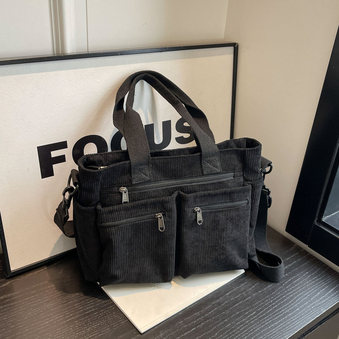 Durable shoulder bag with multiple compartments Stornfield