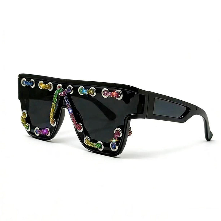 Ladies sunglasses with extravagant design and decorative chain embellishment Stornfield