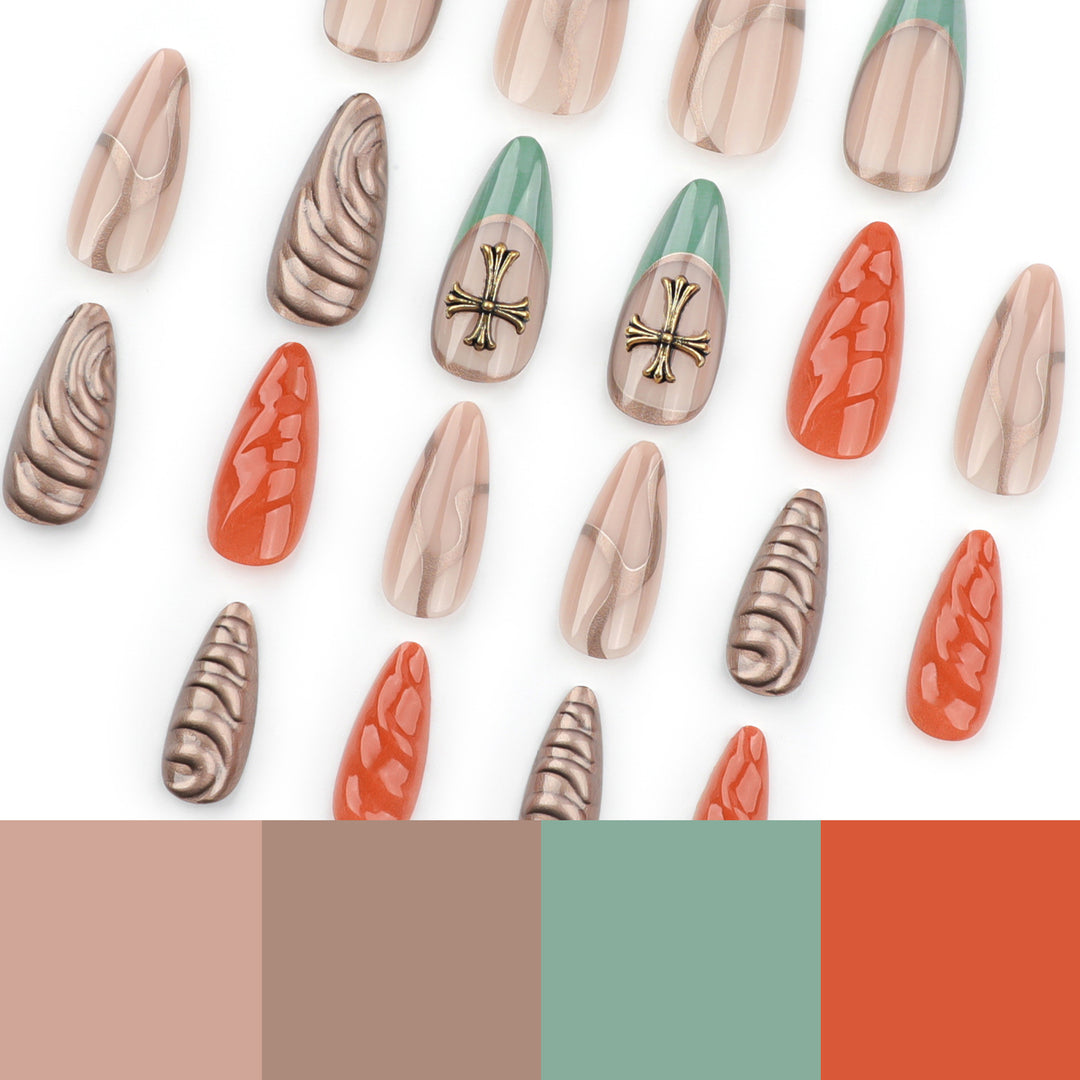 Artful stiletto nails with glitter and motif decorations Stornfield
