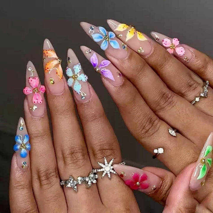 Artificial nail tips with floral decorations Stornfield