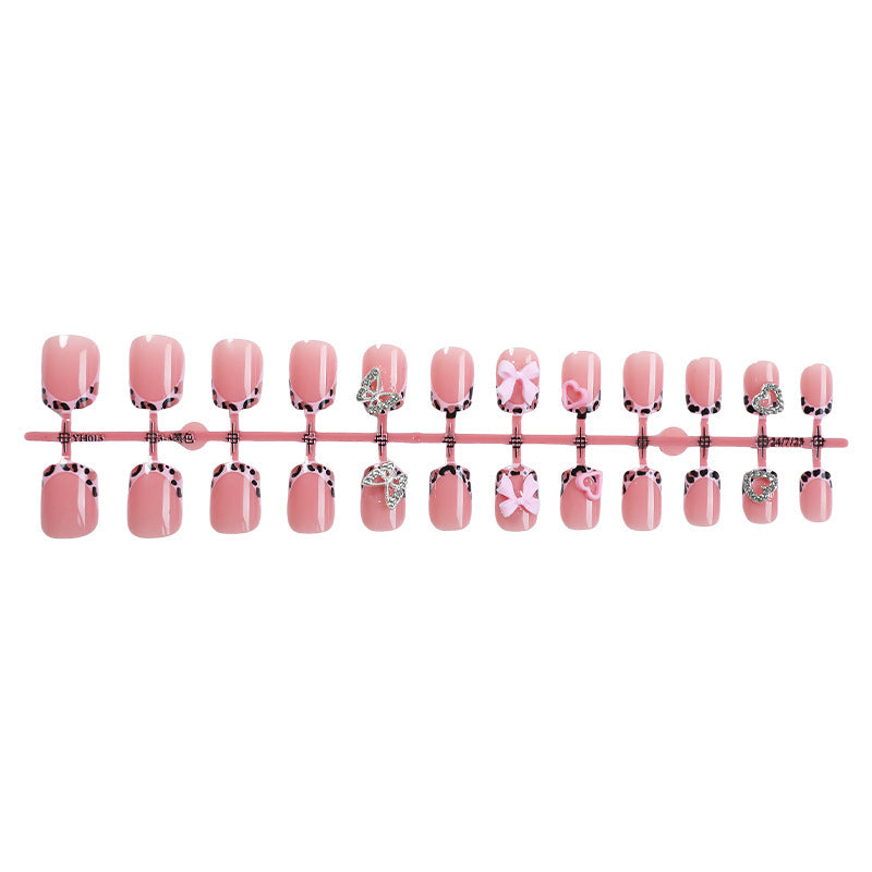 Artificial nail art with embellishments Stornfield