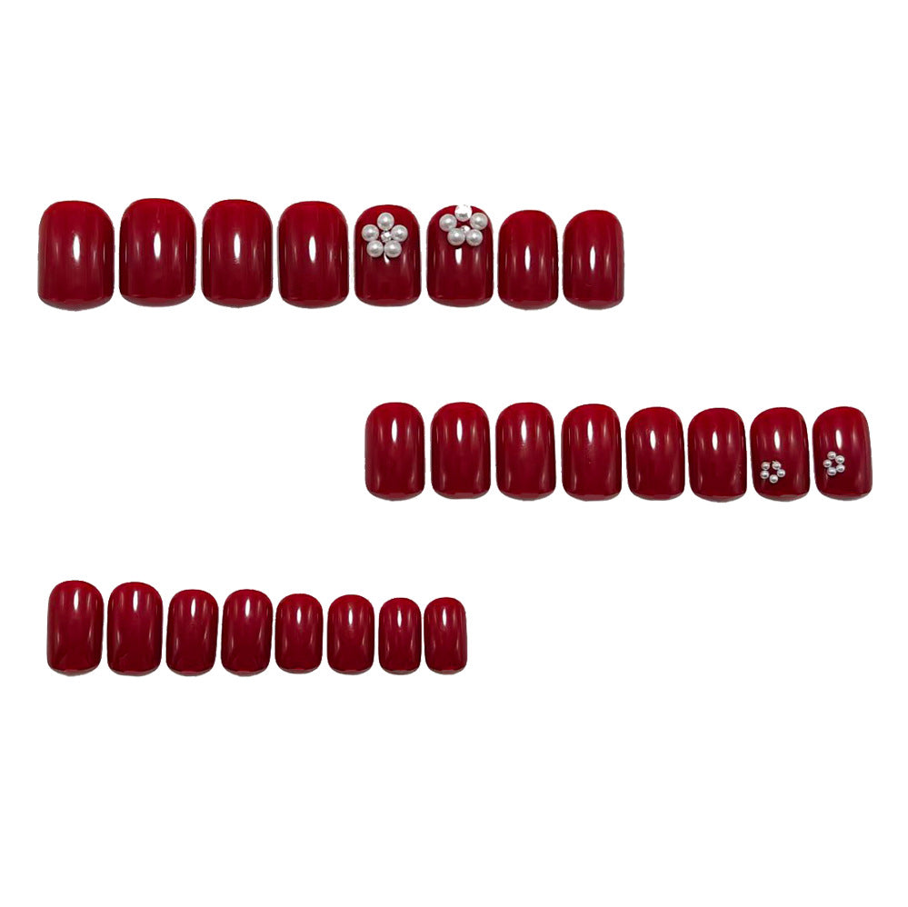 Artificial nails with glamorous decorations Stornfield