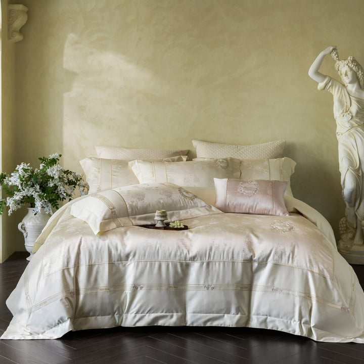 Luxurious satin bedding set with embroidered medallions and elegant quilting