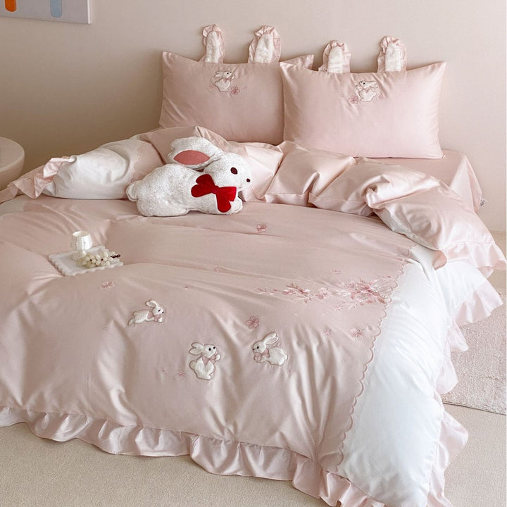 Bedding set with applied bunny embroidery, frill edge, and decorative pillow ears