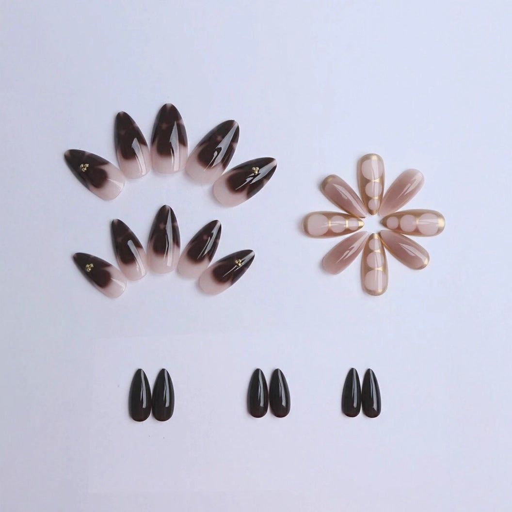 Artificial nail set with elegant ombre design and gold embellishments Stornfield
