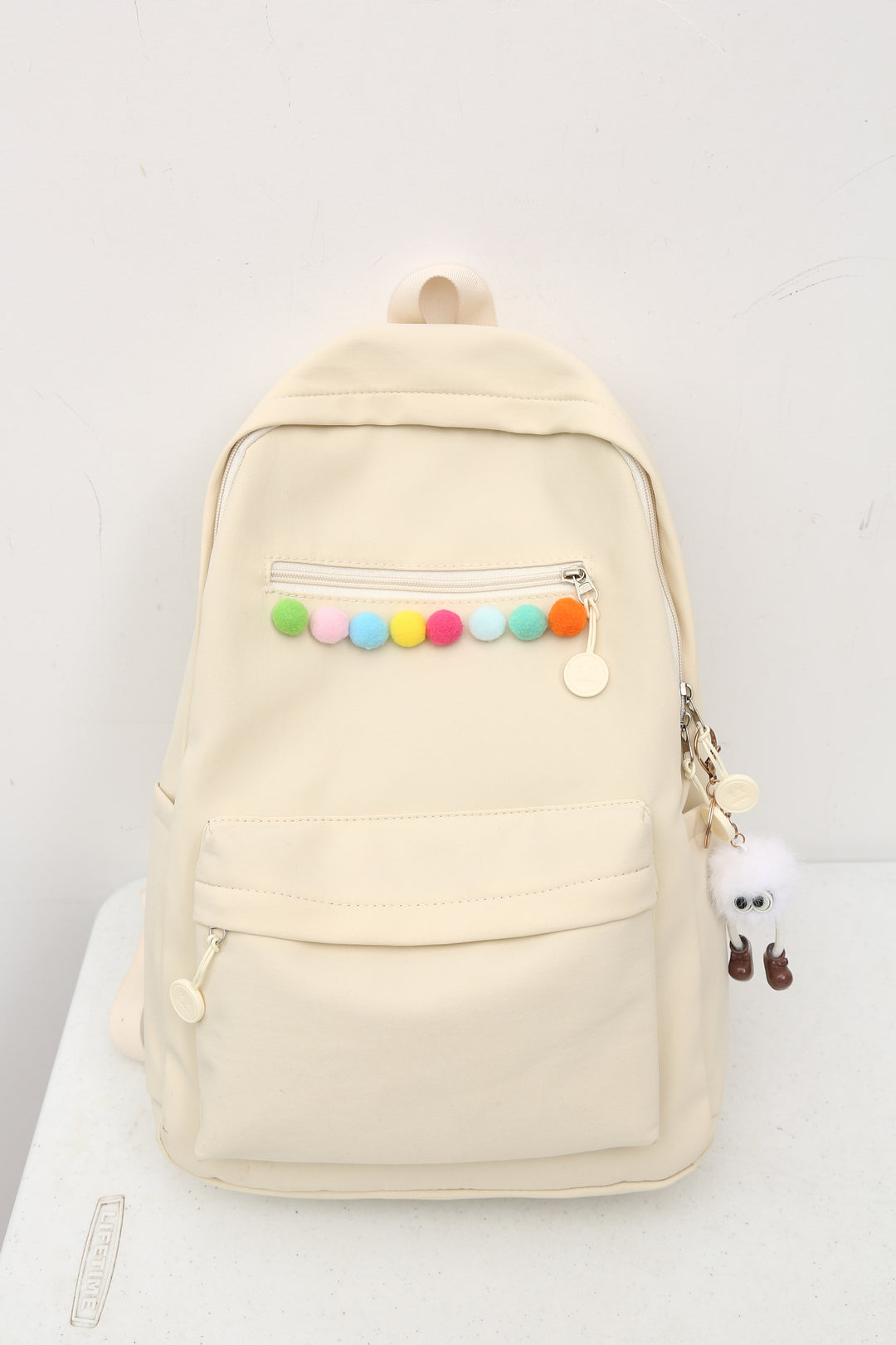 Practical backpack with colorful applications Stornfield