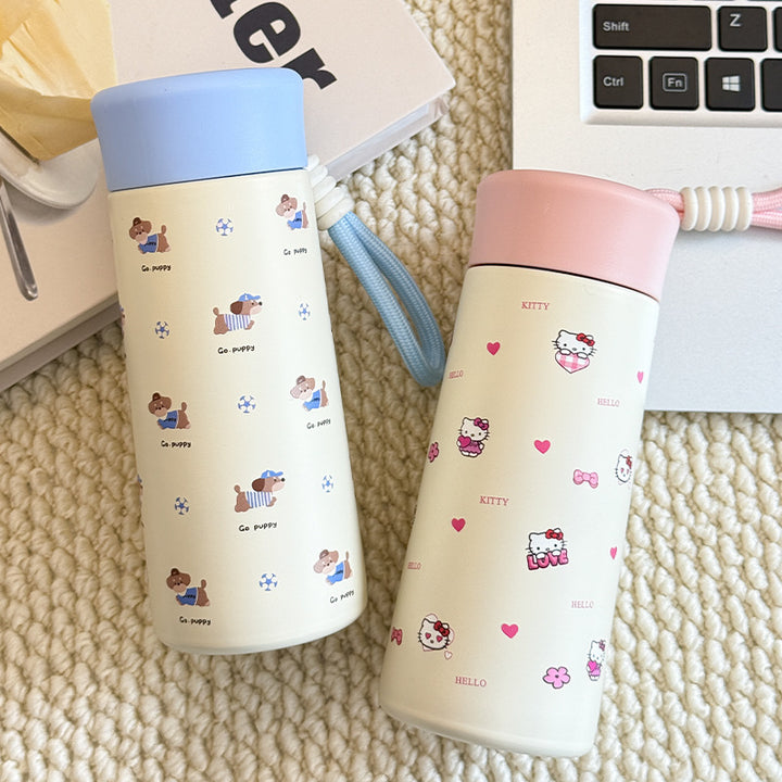 Women’s insulated drinking bottle with practical carrying strap and playful design Stornfield