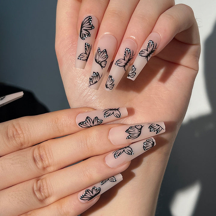 Artistic Nail Extensions with Butterfly Design Stornfield
