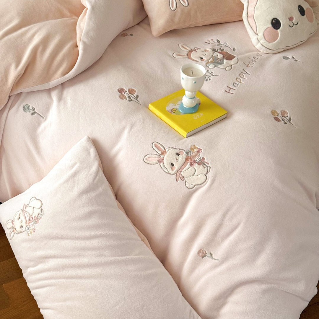 Cute children's bedding set made of soft cotton terry with embroidered cat appliqués and cuddly plush pillow.