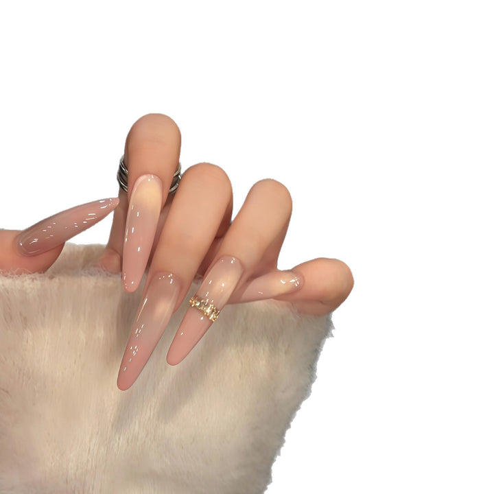 Glamorous artificial nails with elegant glitter and rhinestone application Stornfield