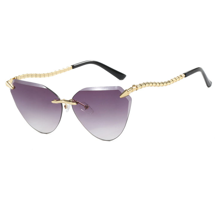 Women's Cat-Eye Sunglasses with unique gold frame design and protective lenses Stornfield