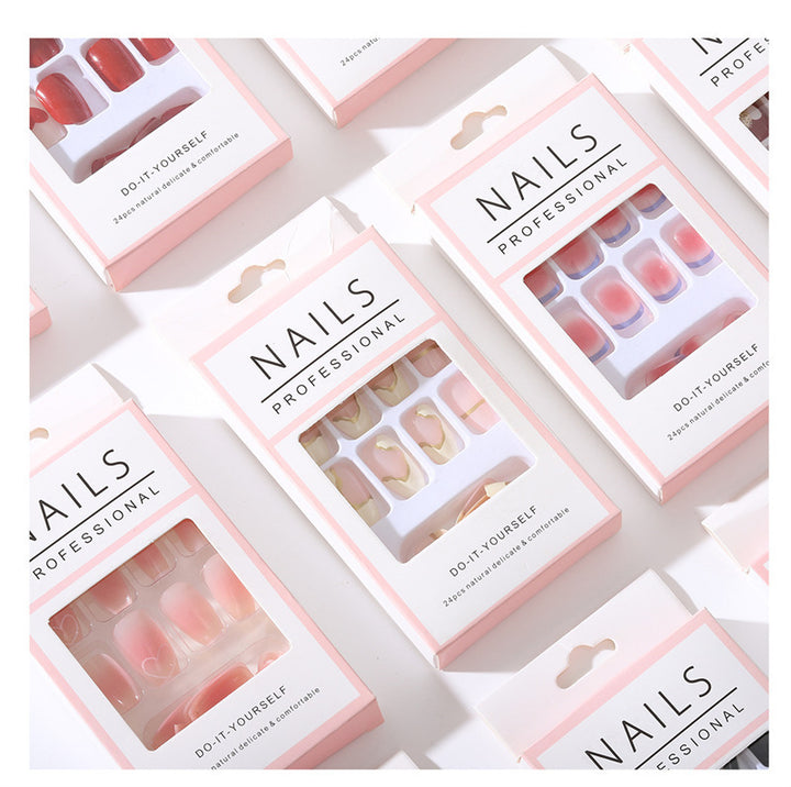 Artificial nail set with elegant stiletto design and glossy accents Stornfield