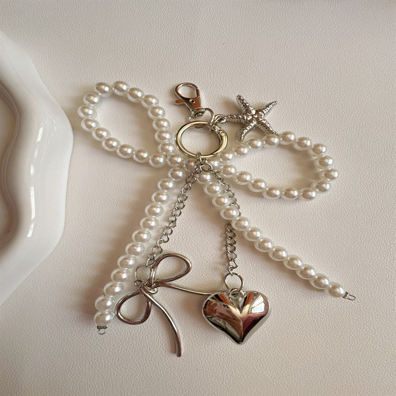 Elegant Pearl Charm Keychain Stornfield