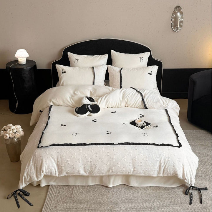 Reversible cotton satin bedding set with embroidered cherry, delicate frill and decorative bows Stornfield