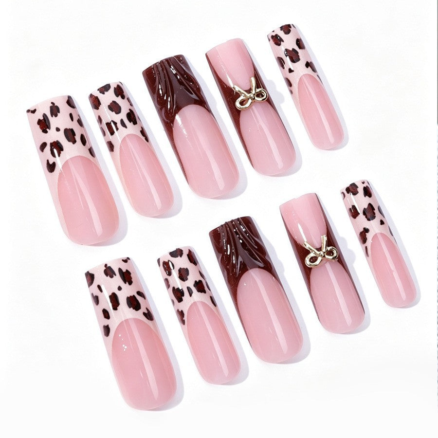 Nail set with stylish leopard pattern and elegant accents Stornfield