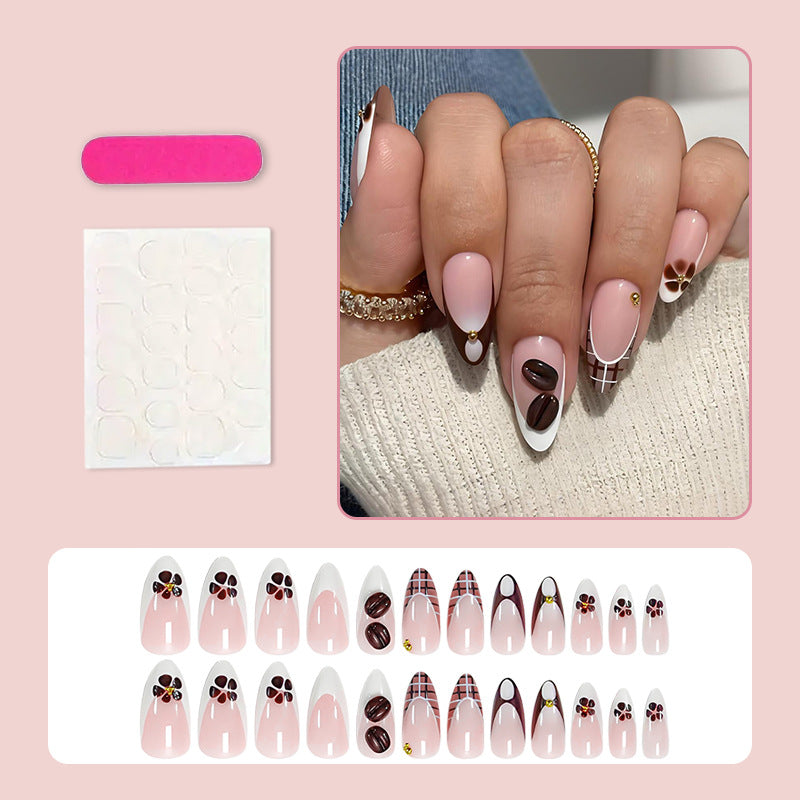 Art nail set with elegant coffee and flower motif Stornfield