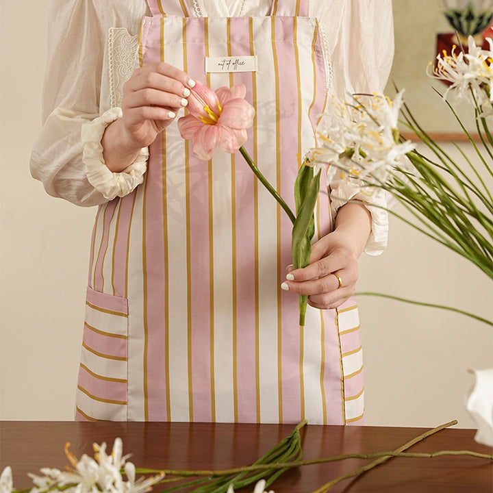 Bib apron with crossed straps and large front pockets Stornfield