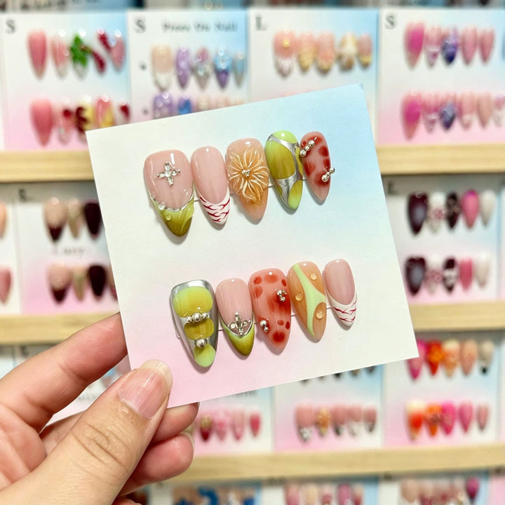 Artistic Press-On Nail Set with Decorative Floral and Gem Accents