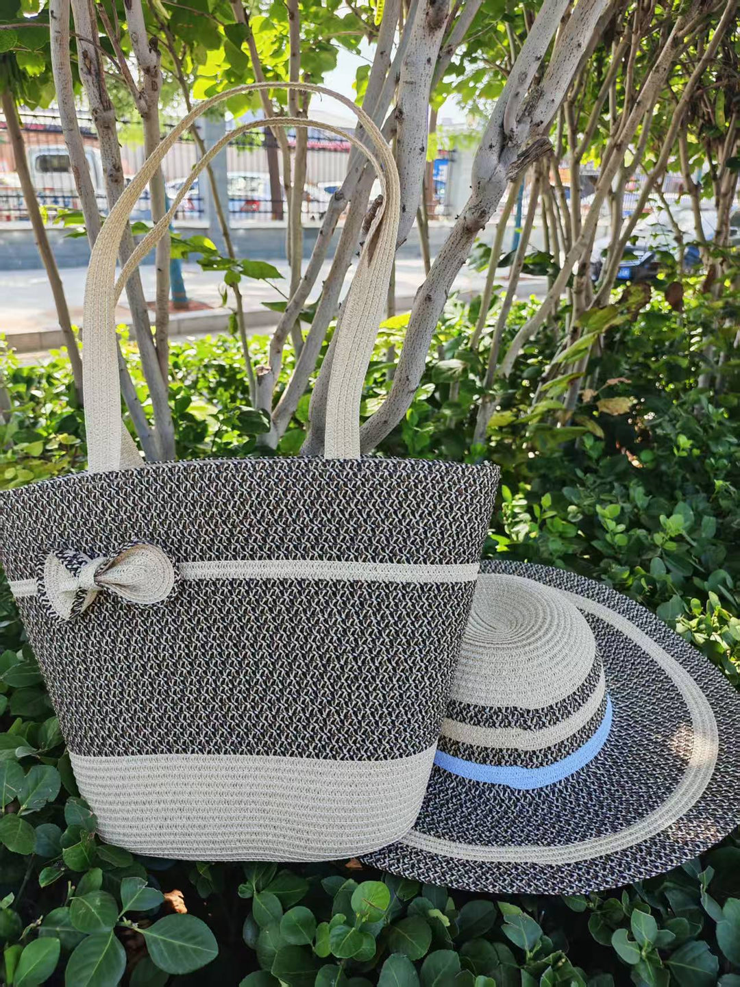 Elegant sun hat with wide brim and subtle stripe pattern Stornfield