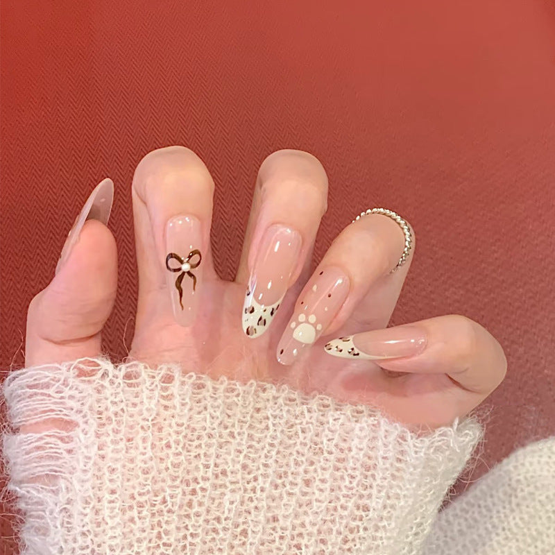 Decorative Press-On Nail Art with Bow and Animal Accents Stornfield