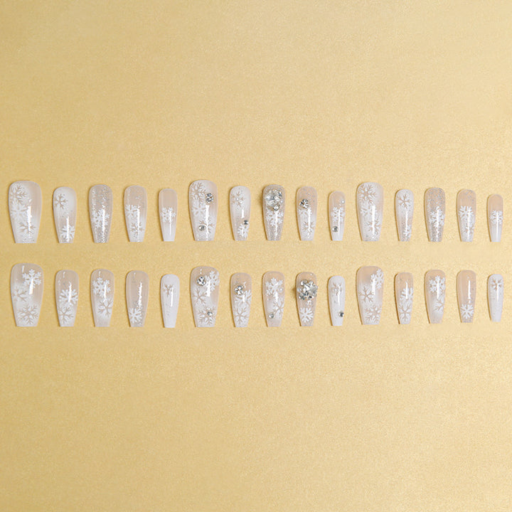 Artificial nail set with frosty snowflake design and sparkling 3D applications Stornfield
