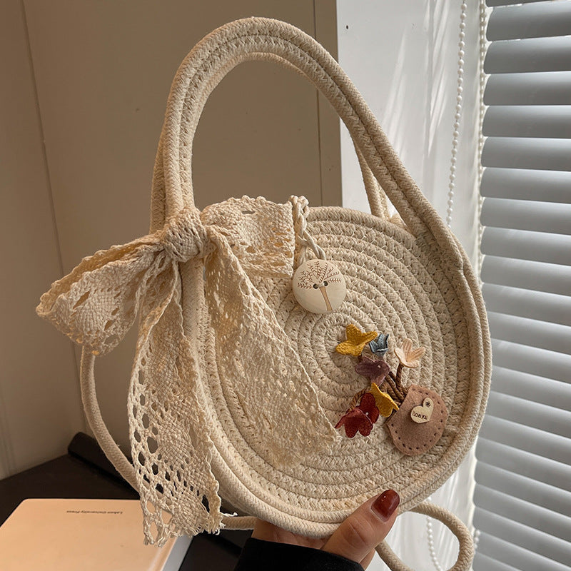 Handcrafted Floral Accent Straw Bag