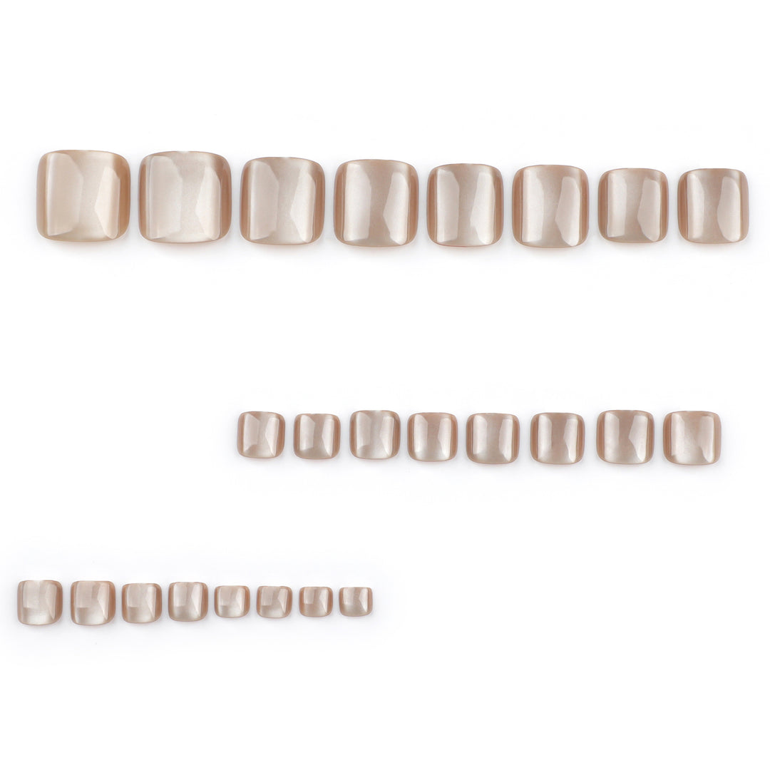 Artful toenail design with glossy accents Stornfield