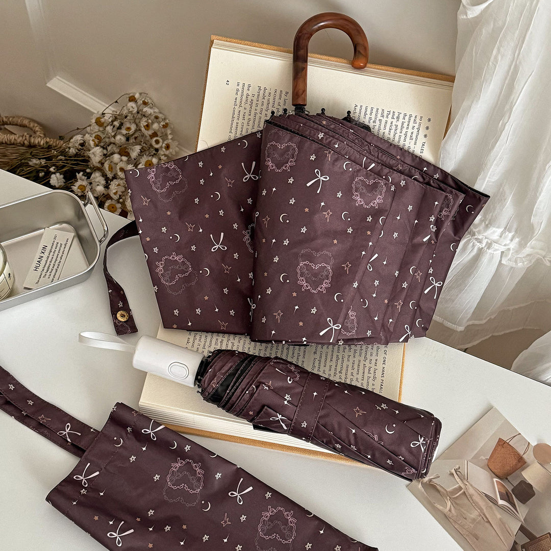 Women's folding umbrella with elegant pendant design Stornfield