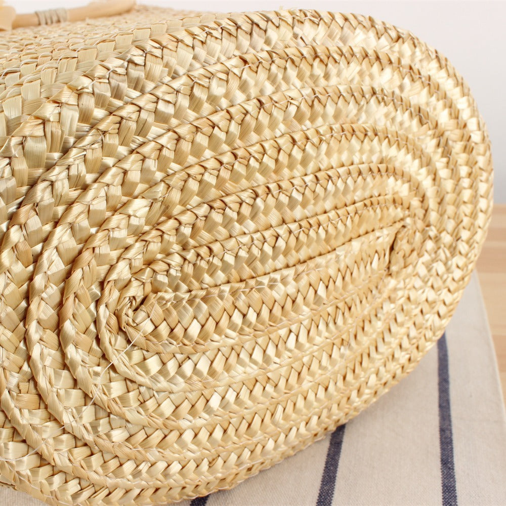 Braided straw bag with floral accent Stornfield