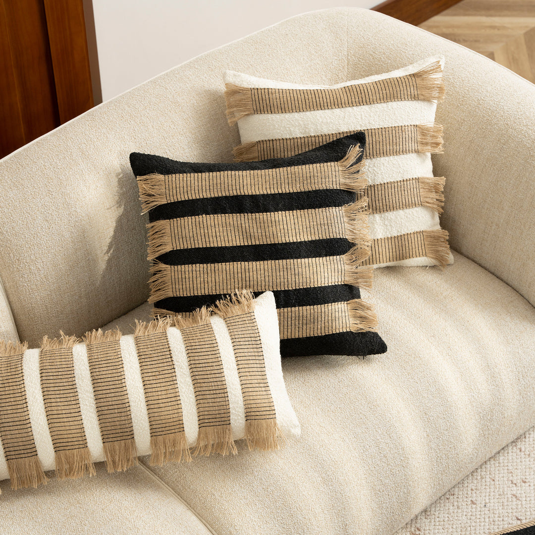 Rectangular boucle decorative pillow with hand-woven jute stripes and long fringes