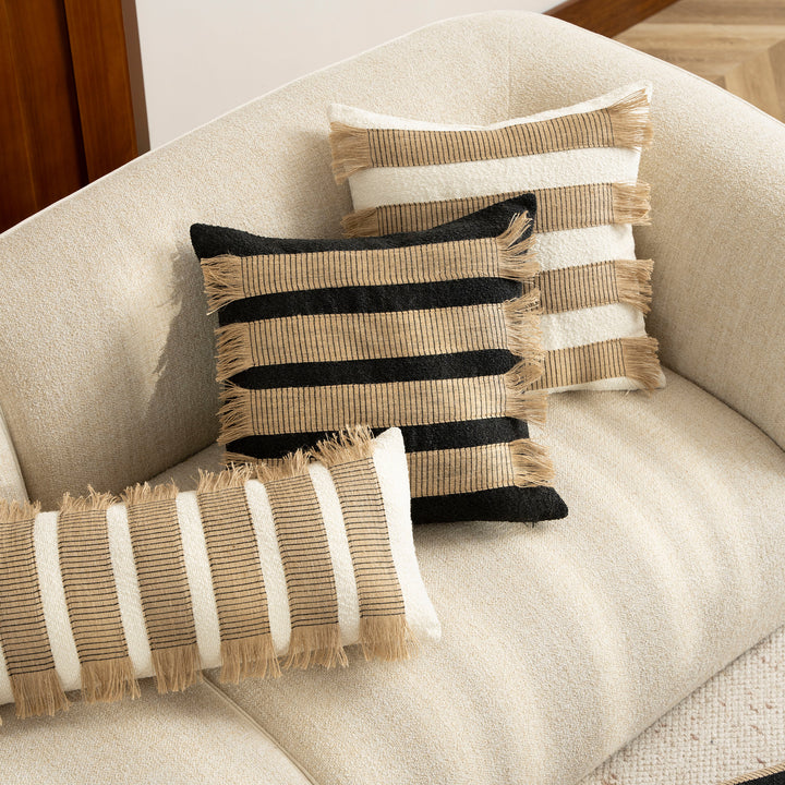 Rectangular boucle decorative pillow with hand-woven jute stripes and long fringes