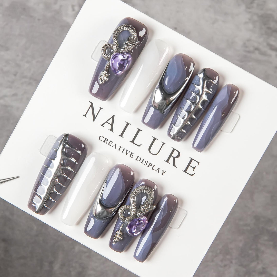 Artistic Sculpted Nail Set with Metallic Accents