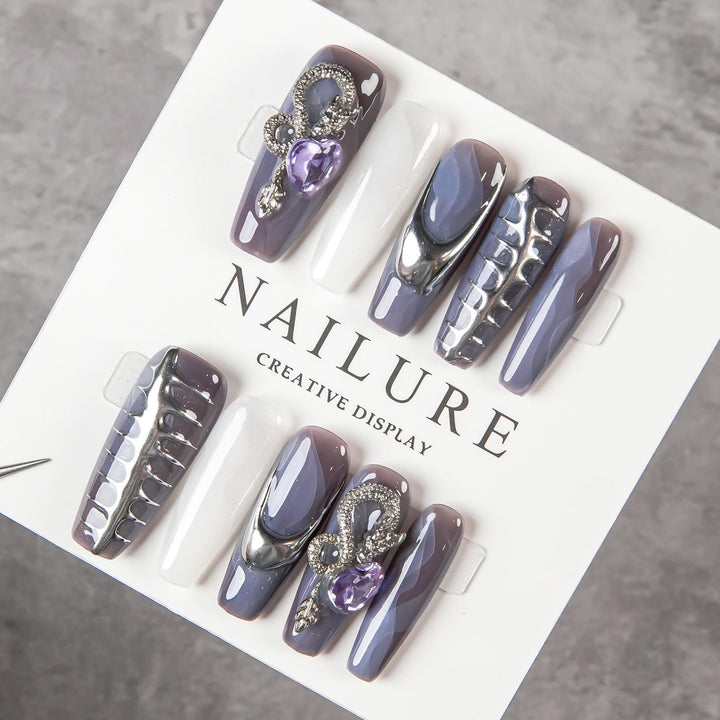 Artistic Sculpted Nail Set with Metallic Accents
