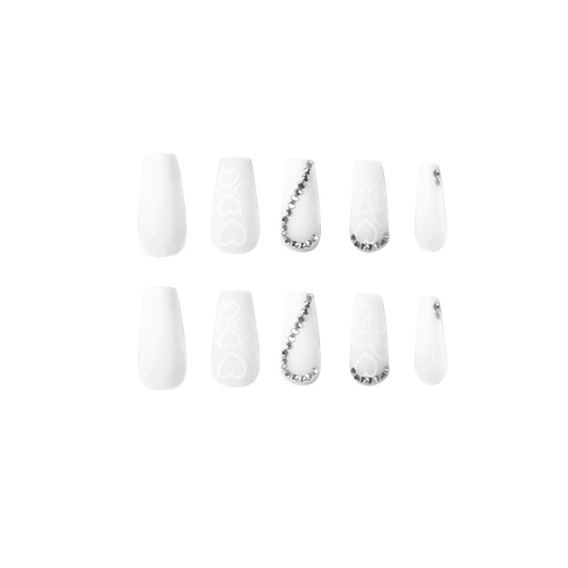 Artful Nail Extensions with Heart Design and Glitter Accents Stornfield