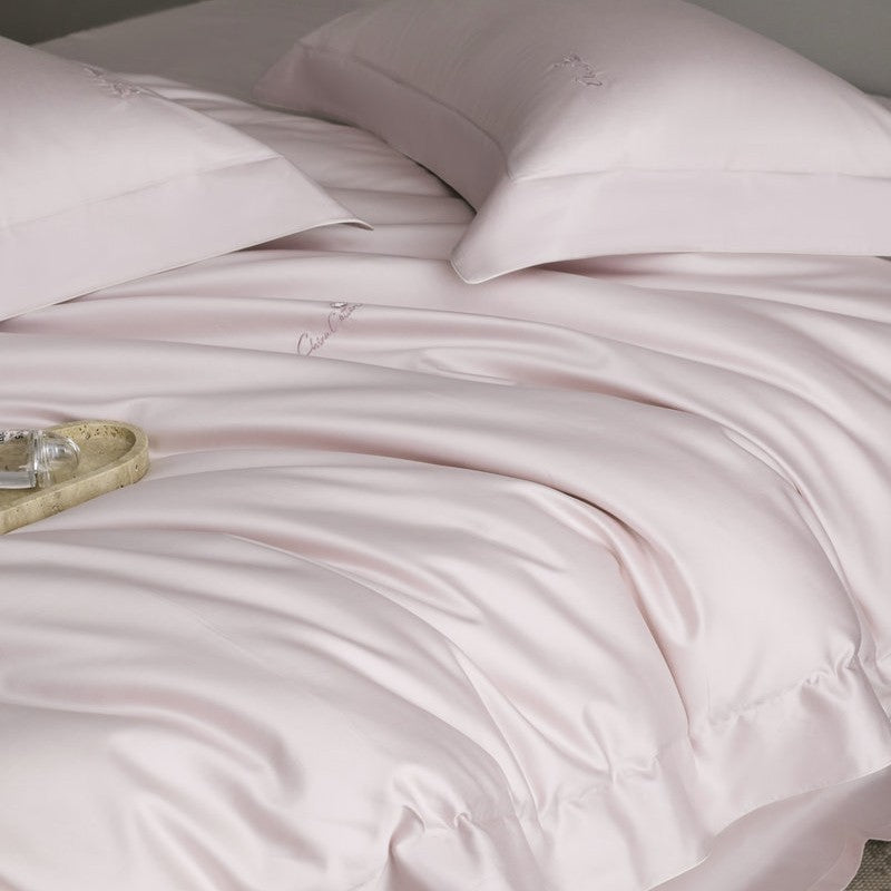 Bedding set made of fine satin with a silky-smooth finish and embroidered logo