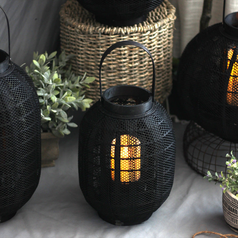 Elegant metal lantern with net design Stornfield
