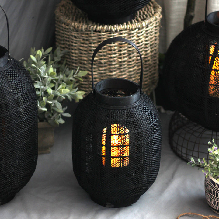 Elegant metal lantern with net design Stornfield