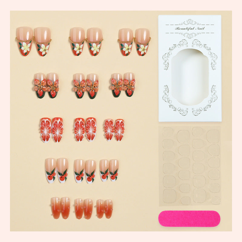 Artificial nail set with colorful flower and glitter accents Stornfield